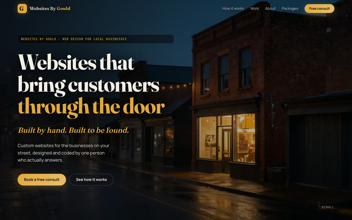 The first Websites By Gould site, a dusk main street with a glowing shop window